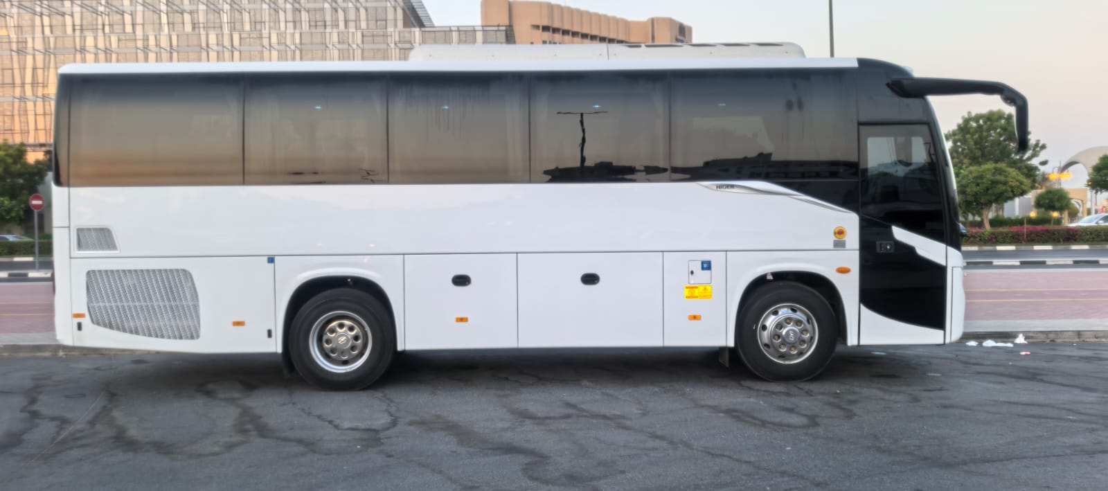 35-seater luxury Higer bus — exterior side view